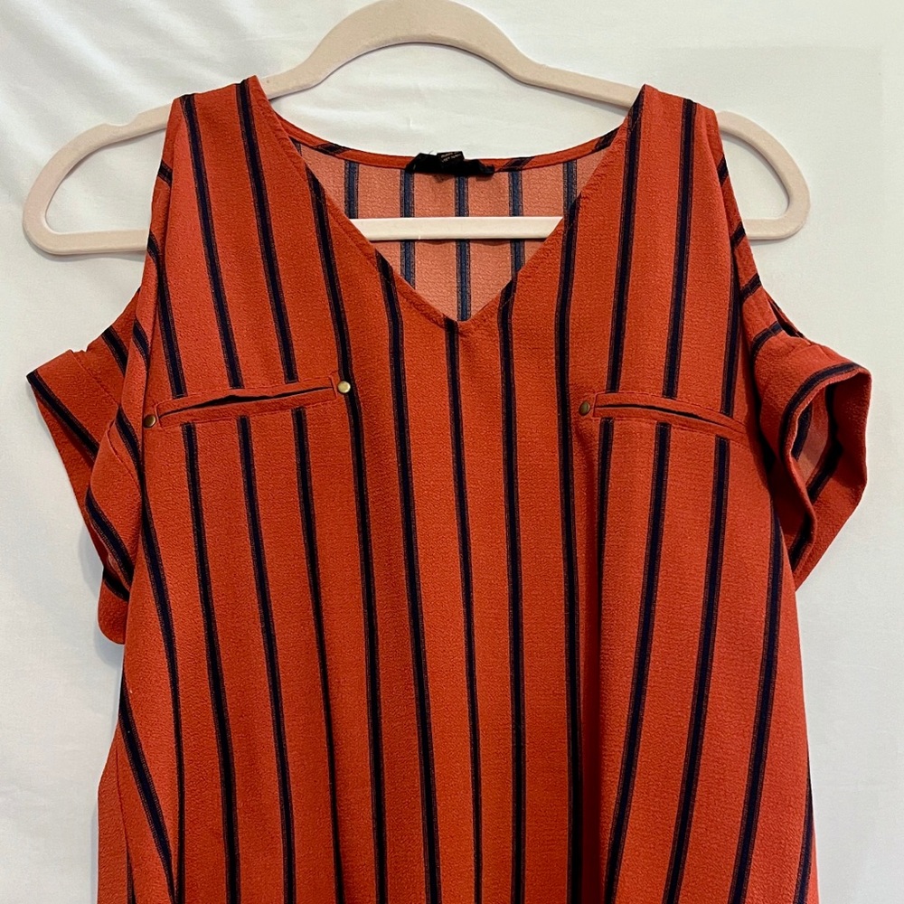 Mine, size medium, blue strip’s , short sleeves